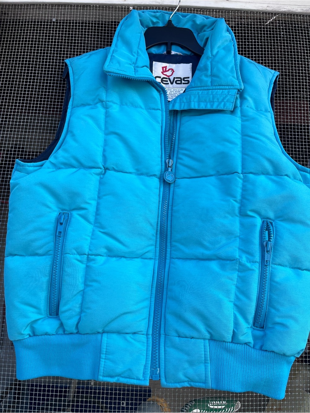 Cevas ladies down filled vest. Size medium. Zip front. Vintage ski vest.